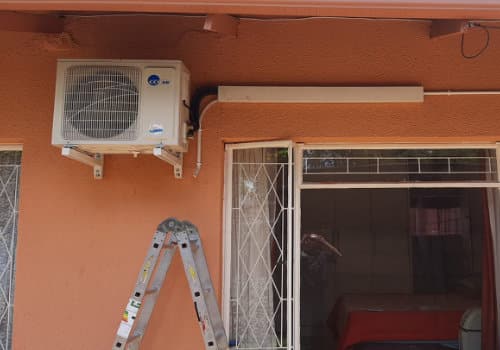 Airconditioner on orange wall